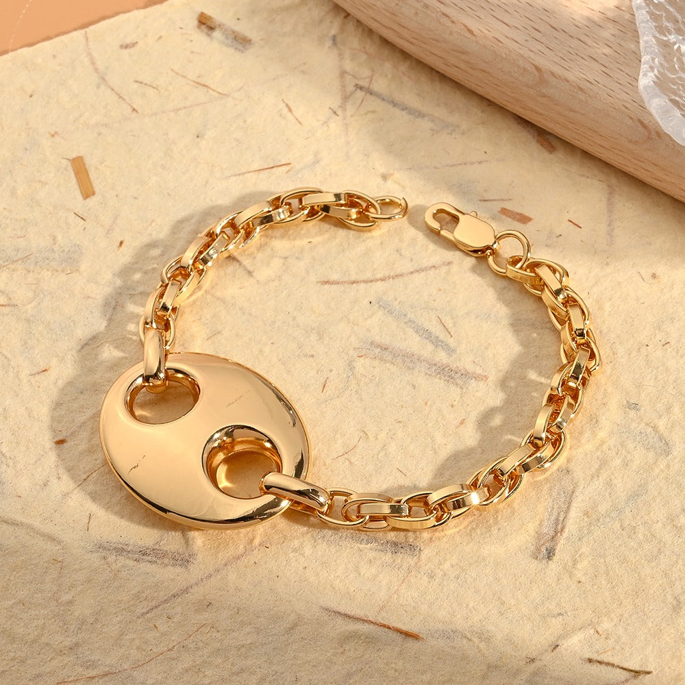 Pulsera dorada Gc