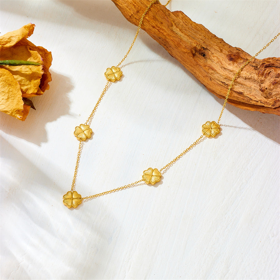 Set Trébol Dorado – Collar y Pulsera con Flores de Cuatro Pétalos