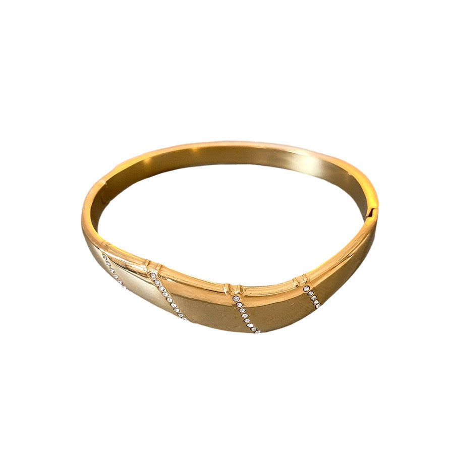 Pulsera Rígida Elegante con Detalles de Cristal – Oro y Plata