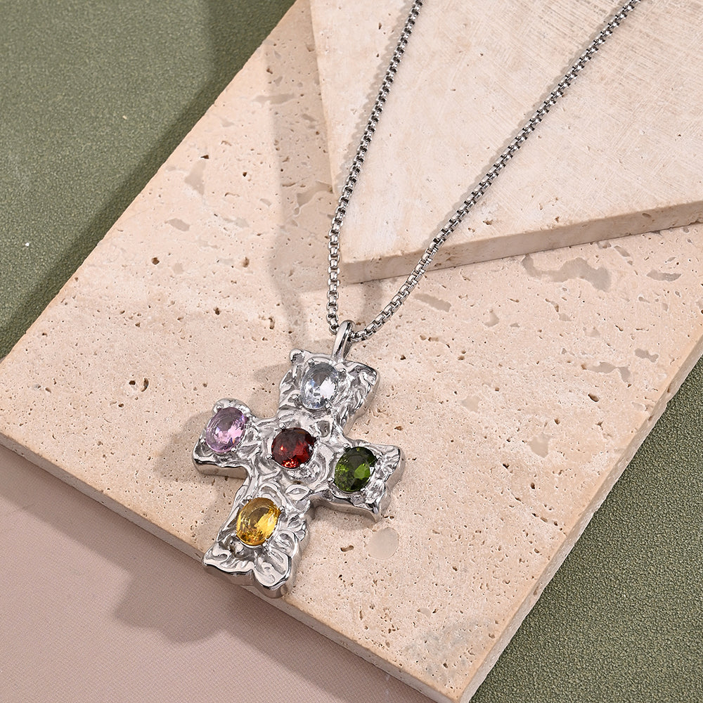 Cruz con piedras de colores