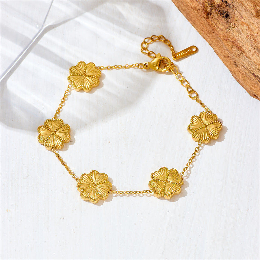 Set Trébol Dorado – Collar y Pulsera con Flores de Cuatro Pétalos
