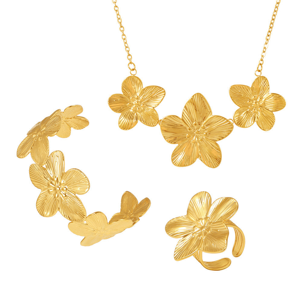 Set Floral en Acero Inoxidable – Collar, Pulsera y Anillo Ajustable