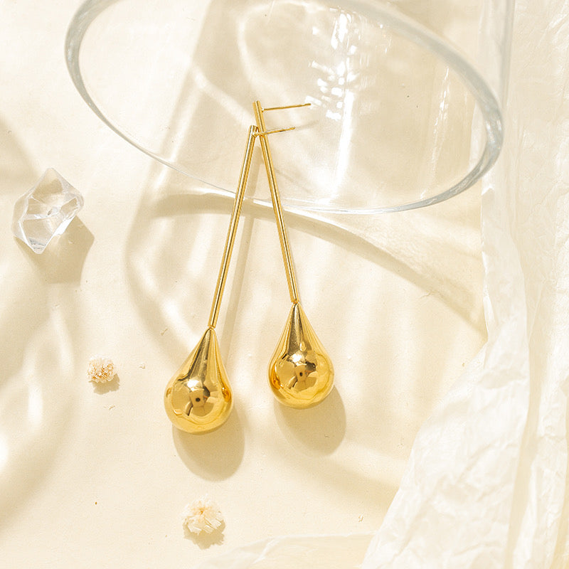 Aretes Gota Dorada Estilo Minimalista
